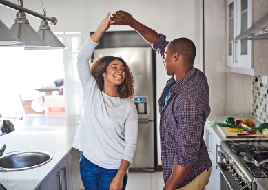 Young Couple Dancing in Kitchen